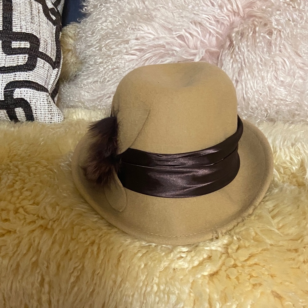 Elegant Tan Hat with Brown Band and real fur decoration.